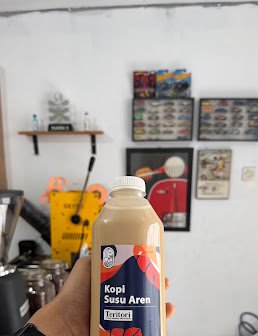 Kemasan Botol Kopi Susu Aren Teritori Kopi